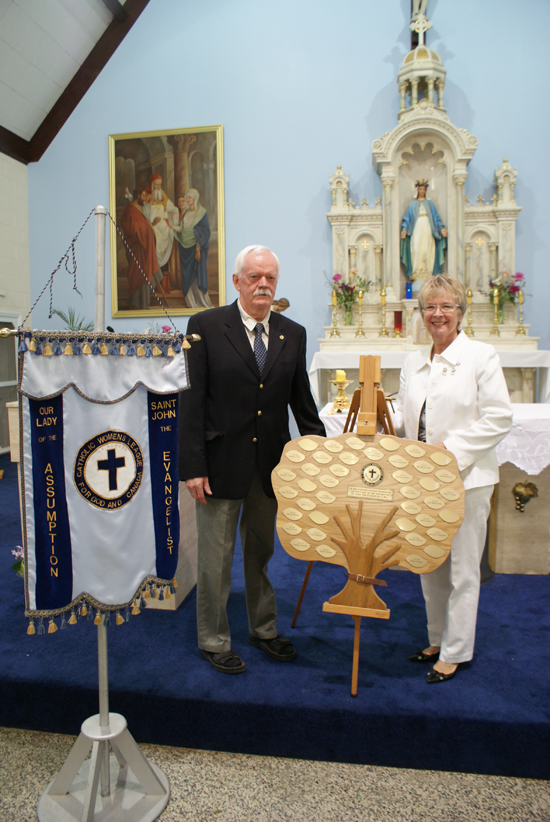 CWL - Mike Malloy creator and Sandra O'Toole designer pose with plaque